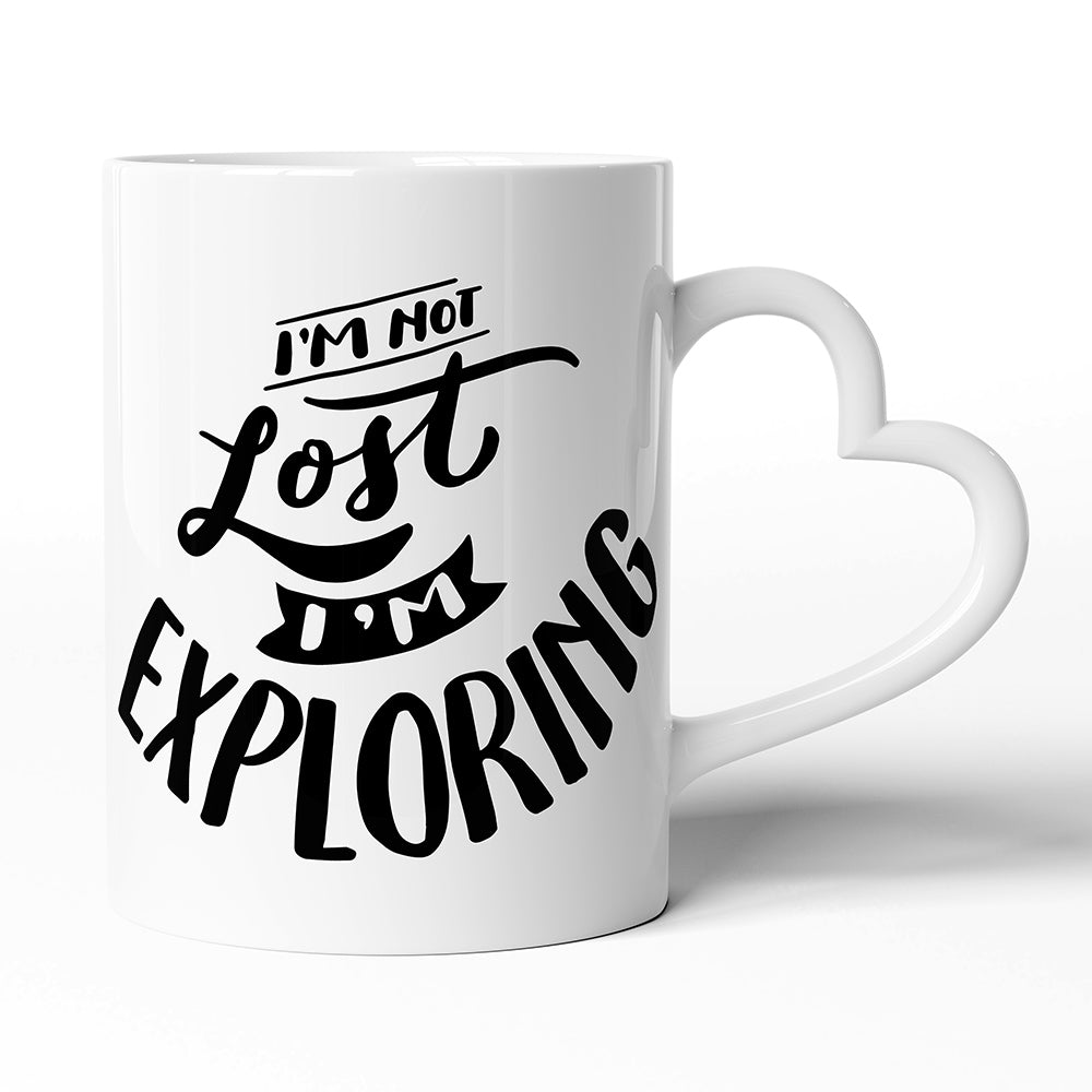 Keramický hrníček s uchem ve tvaru srdce motiv I'm not lost I'm exploring